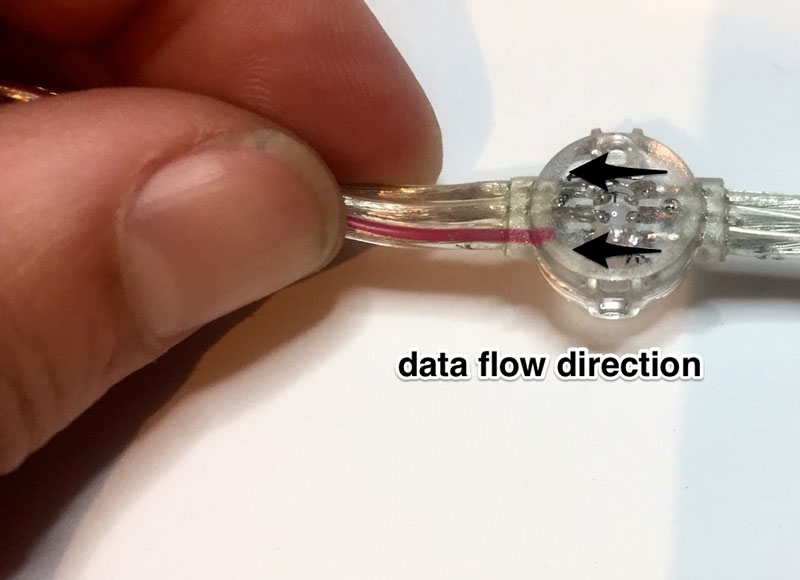 NeoPixel color data travels from &ldquo;in&rdquo; end to &ldquo;out&rdquo; end